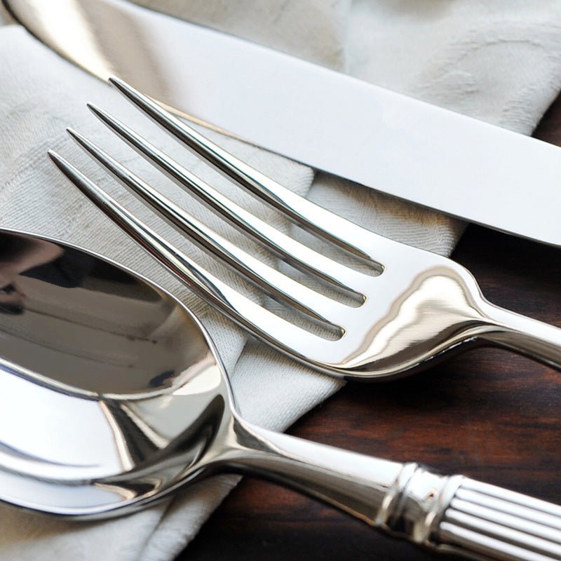 4 - teiliges Besteckset aus Silber mit geriffeltem Griff - Besteck - Set - Voldeva