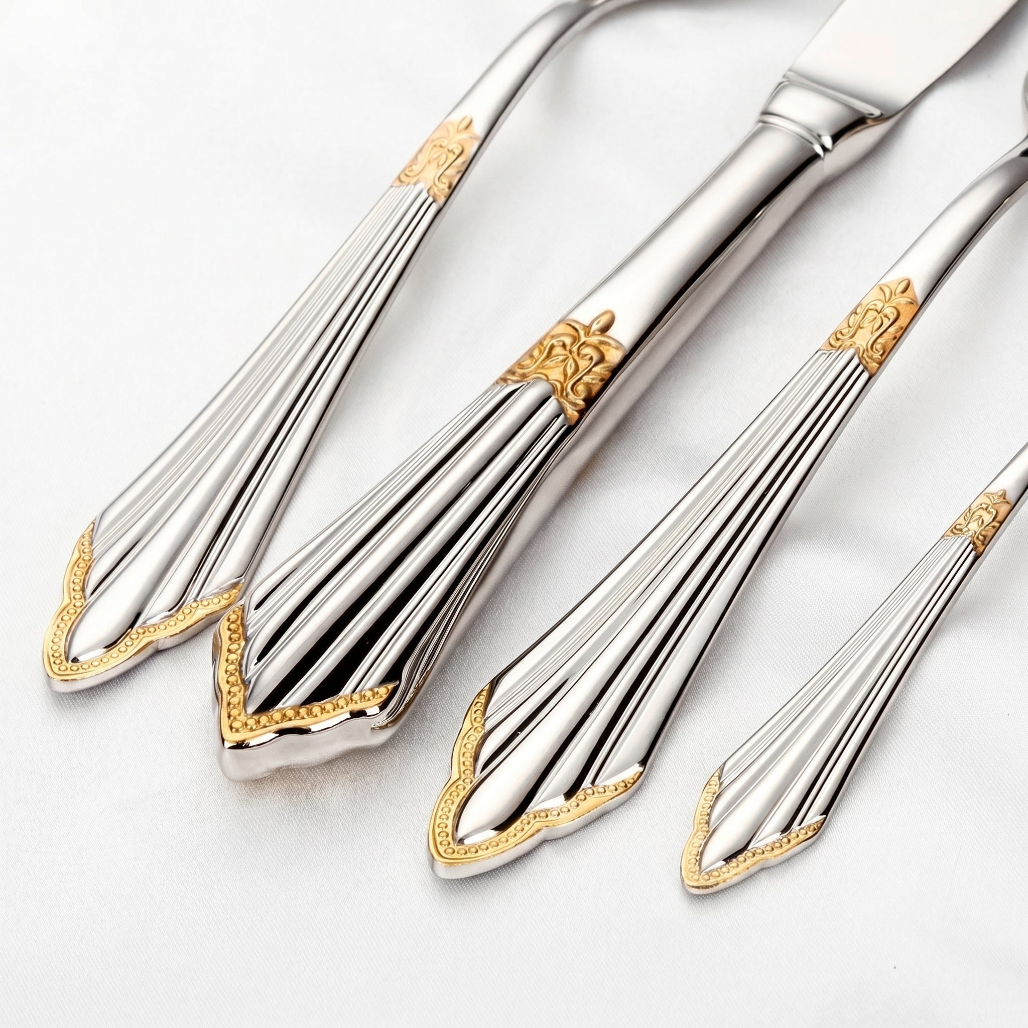 4 - teiliges Besteckset mit goldenen Details - Besteckset - Voldeva