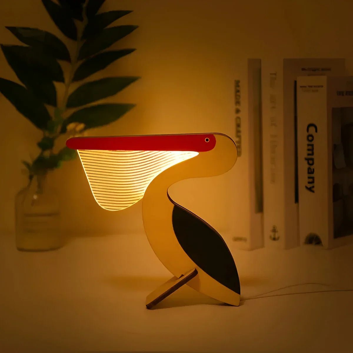 BeamBud - Holztier Tischlampe mit sanftem LED - Licht - Tischlampe - Pelikan - Voldeva