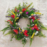 Bunter Kranz aus Kunstblumen
