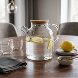 Glas Teekanne mit Holzdeckel und Seitengriff