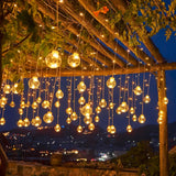 LED-Lichtervorhang mit hängenden Glaskugeln für Innen und Außen
