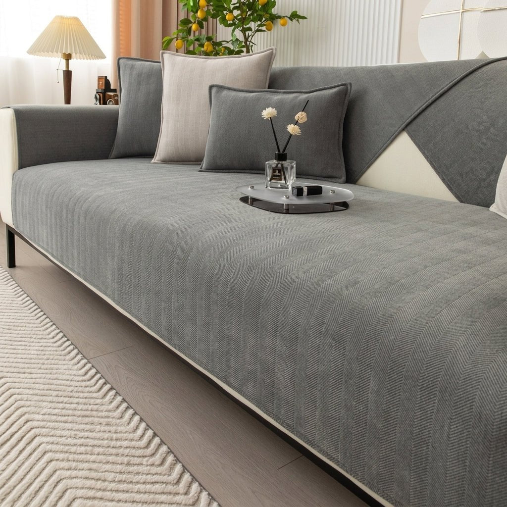 Moderner Sofaschoner mit strukturiertem Fischgrätgewebe - Sofadecke - Grau - Voldeva